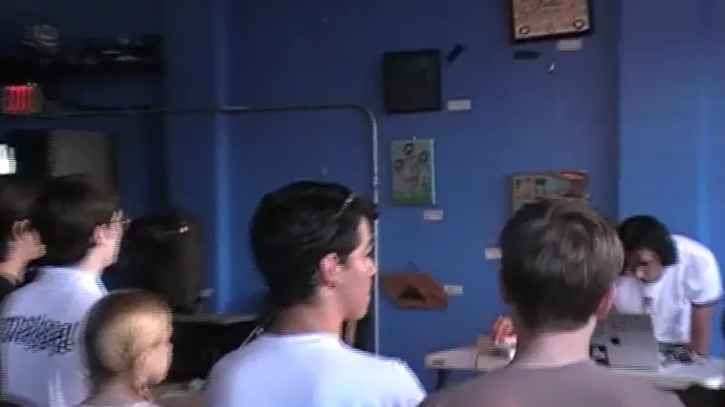 Several short clips of a show at a local venue showing the crowd and artist performing.